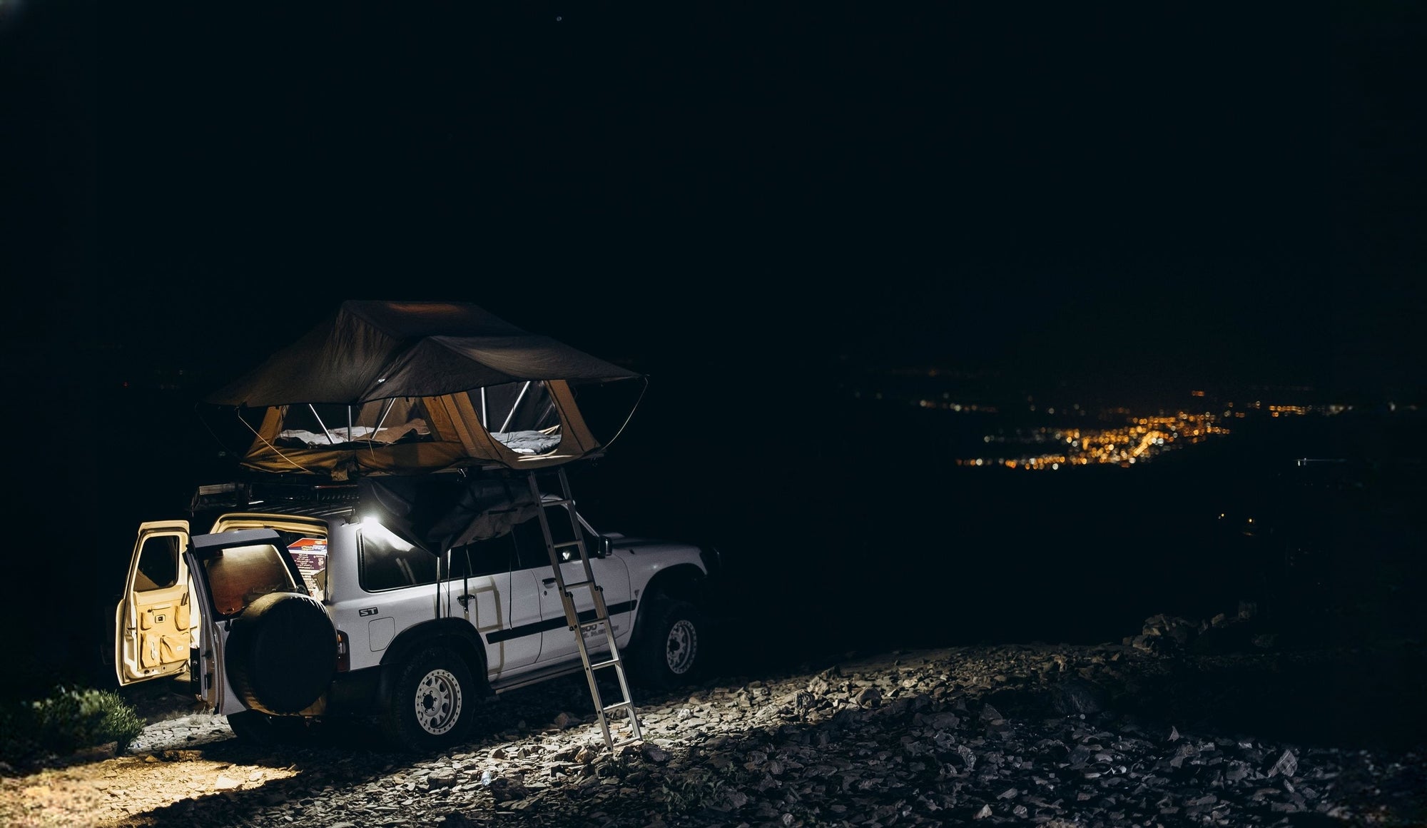 argoing slide patrol tenda tetto notte panorama