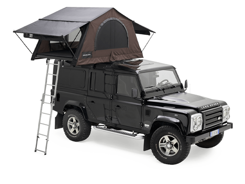 Land Rover Defender nero con tenda da tetto Autohome Nomadland marrone aperta e scala